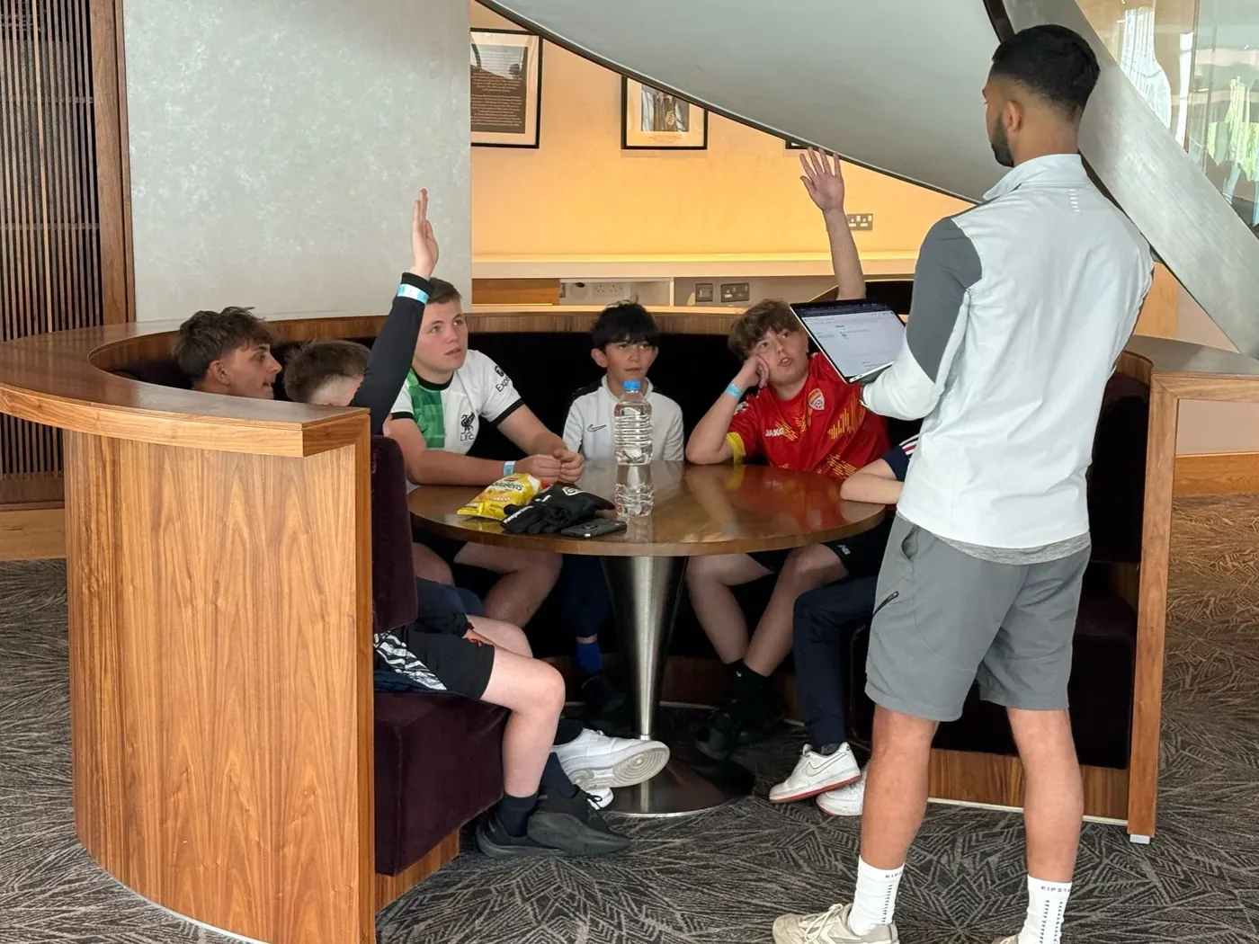Farhan leading a mindset session with a group of young players